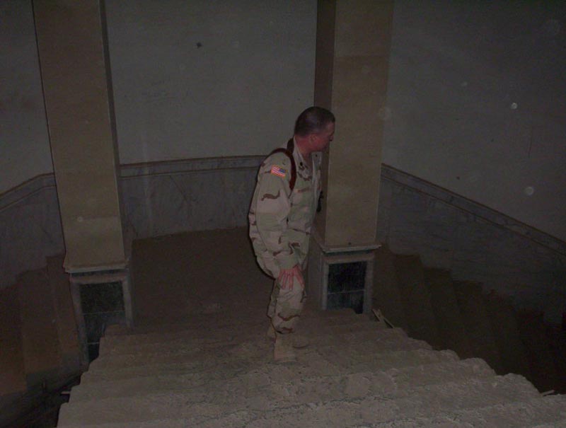 LTC Roberts posing for pic on stairs
